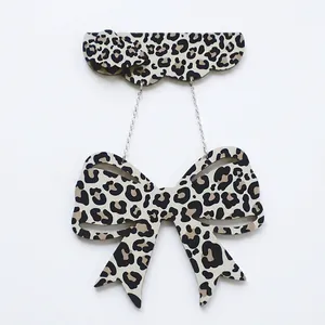 Creative leopard print bow wooden pendant featuring minimalist style for home decoration