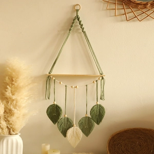 Handmade boho macrame wall shelf with woven leaf tassels and wood beads decor