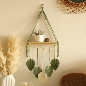 Bohemian hand-woven wall shelf with macrame leaves and wooden beads for home decor