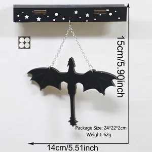 Detailed view of black dragon silhouette wall hanging with 15cm height dimensions
