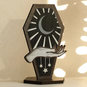 Gothic black wooden coffin-shaped tabletop ornament with silver moon and hand design