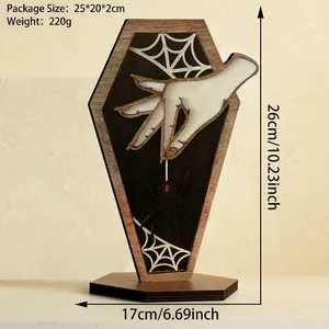 Detail showing the wooden coffin-shaped shelf with a spider and web gothic design