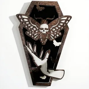 Gothic coffin-shaped wooden wall art featuring skull death moth and skeletal hand design