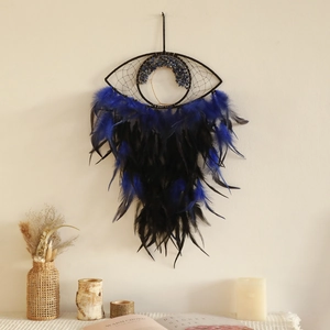 Handmade Evil Eye dream catcher with blue feathers and stones for wall hanging decor