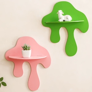Creative fluid drop shape wooden wall shelf with small plant and decorative ornament