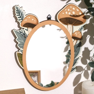 Minimalist mushroom forest wall mirror with oval acrylic lens and wooden aesthetic décor