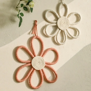 Handmade pink and beige cotton rope flower wall hanging for minimalist home decor