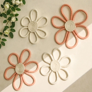 Handwoven cotton rope flower wall decor set in cream and pink tones with 3D texture