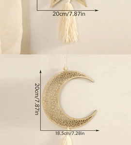 Detail showing carved wooden moon wall hanging with measurements 20cm by 18.5cm and tassels