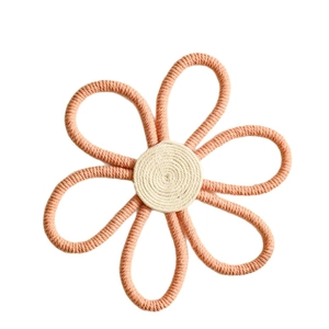 Handmade woven cotton rope flower wall decor in salmon pink and cream white colors