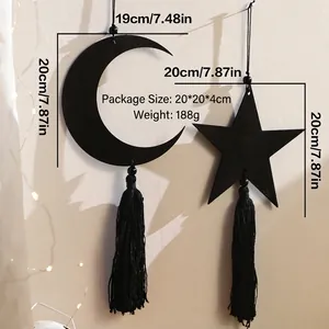Detail showing dimensions of black moon and star wooden wall hanging with tassels