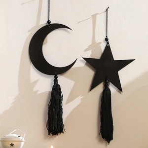 Minimalist black wooden moon and star wall hanging with cotton tassels for home decor