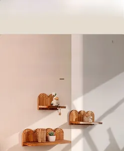 Set of three wooden arch-shaped wall shelves featuring natural grain for home decor