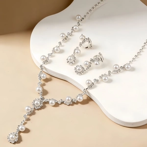 Parure de bijoux de mariée élégante avec collier de perles et boucles d'oreilles