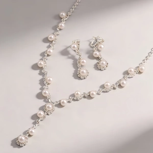 Parure de bijoux élégante en perles et argent avec collier et boucles d'oreilles