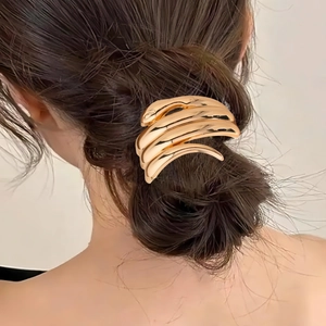 Minimalist gold irregular curved metal hair tie for elegant low ponytail styling