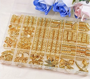 Detail of 250pcs gold braid accessories kit including rings and pendants in a storage box