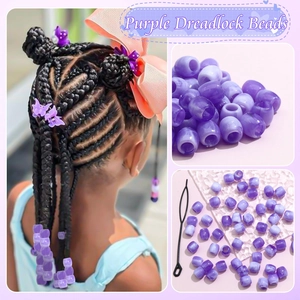 Detail of purple acrylic dreadlock beads with marble texture and beading tool kit