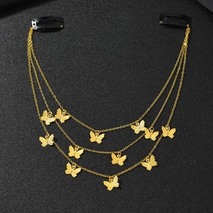 Golden multi-layer butterfly hair chain with black BB clips and metallic pendants