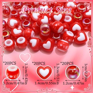 Detailed view of red acrylic love beads and heart charms for hair braiding DIY sets