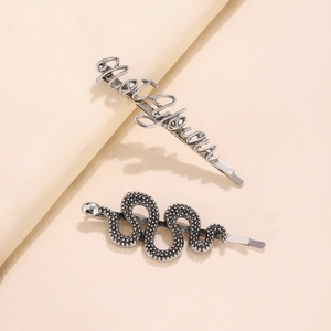 Retro silver hair clip set featuring snake design and artistic letter styling hairpins