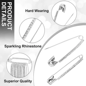 Detail view of silver safety pin brooch featuring sparkling white rhinestones on alloy base