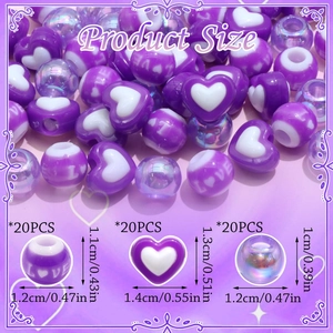 Macro detail of acrylic LOVE beads and heart charms for hair braiding and DIY jewelry