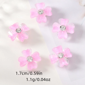 Detailansicht der rosa Blumen-Haarclips mit Glitzer und Größenangaben in Zentimetern