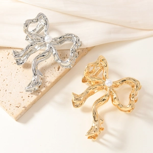 Elegante Haarklammern aus Flüssigmetall mit Schleife und Perle in Gold und Silber
