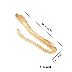 Detailed view of wave-shaped golden alloy hair clip with size and weight dimensions