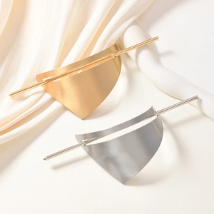 Minimalist geometric triangle hair pin set with brushed metal texture in gold and silver