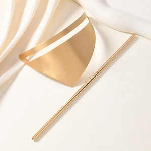 Golden geometric hollow triangle hair pin set with elegant brushed matte metal finish
