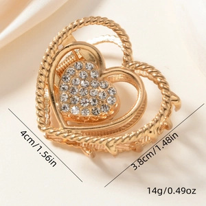 Detail of heart hair claw with rhinestones showing dimensions 4cm and weight 14g