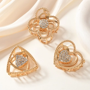 Three-piece gold alloy hair claw set with flowers, hearts, and rhinestones in luxury style