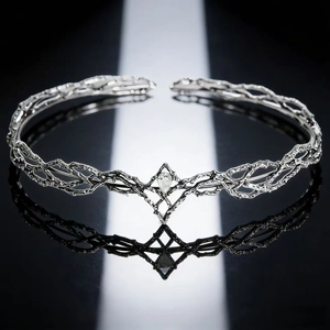 Macro detail of silver branch crown with crystal droplet on reflective surface