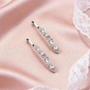 Minimalist silver barrette set with marquise and round rhinestones in a floral pattern