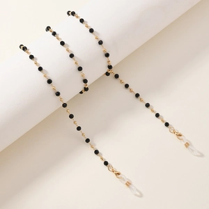 Elegant gold metal bead and black bead eyewear chain with lobster clasps and silicone loops