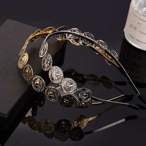 Set of gold and silver metallic headbands with vintage French coin charms for women