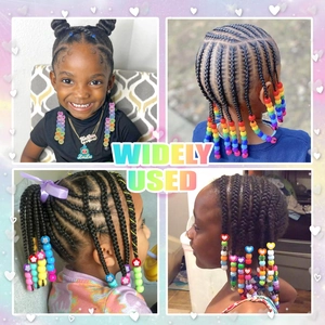 Detailed view of colorful acrylic hair beads in various shapes used on braided hairstyles