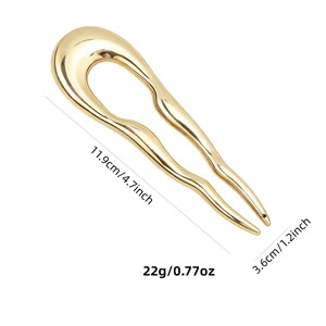 Minimalist U-shaped gold metal hair pin for bun hairstyles with dimensions 11.9x3.6 cm