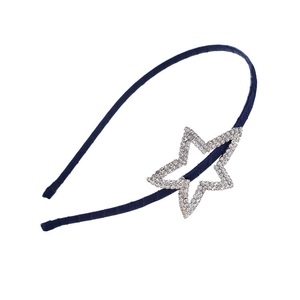Detail of navy blue satin headband with sparkling rhinestone star embellishment