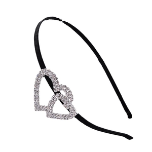 Elegant black headband featuring a double heart design encrusted with sparkling rhinestones