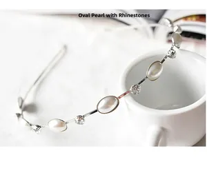 Detail of silver headband with rhinestones and oval pearls on a ceramic cup