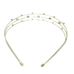 Serre-tête en métal doré à trois couches avec perles et strass sur fond blanc