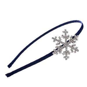 Navy blue velvet headband featuring a luxury sparkling rhinestone snowflake embellishment