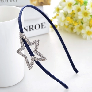 Elegant navy blue satin headband featuring a sparkling rhinestone star on a slim frame