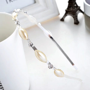 Elegant thin silver metal headband with alternating white pearls and sparkling rhinestones