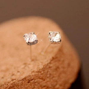 Elegant silver square stud earrings with sparkling cubic zirconia in a classic four-prong setting