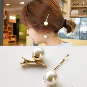 Elegante set haarspelden met grote witte parels en gouden basis voor dagelijkse styling