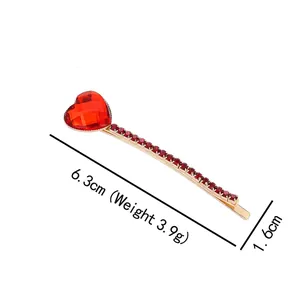 Vintage heart hair clip with red emerald crystal and rhinestones in gold finish